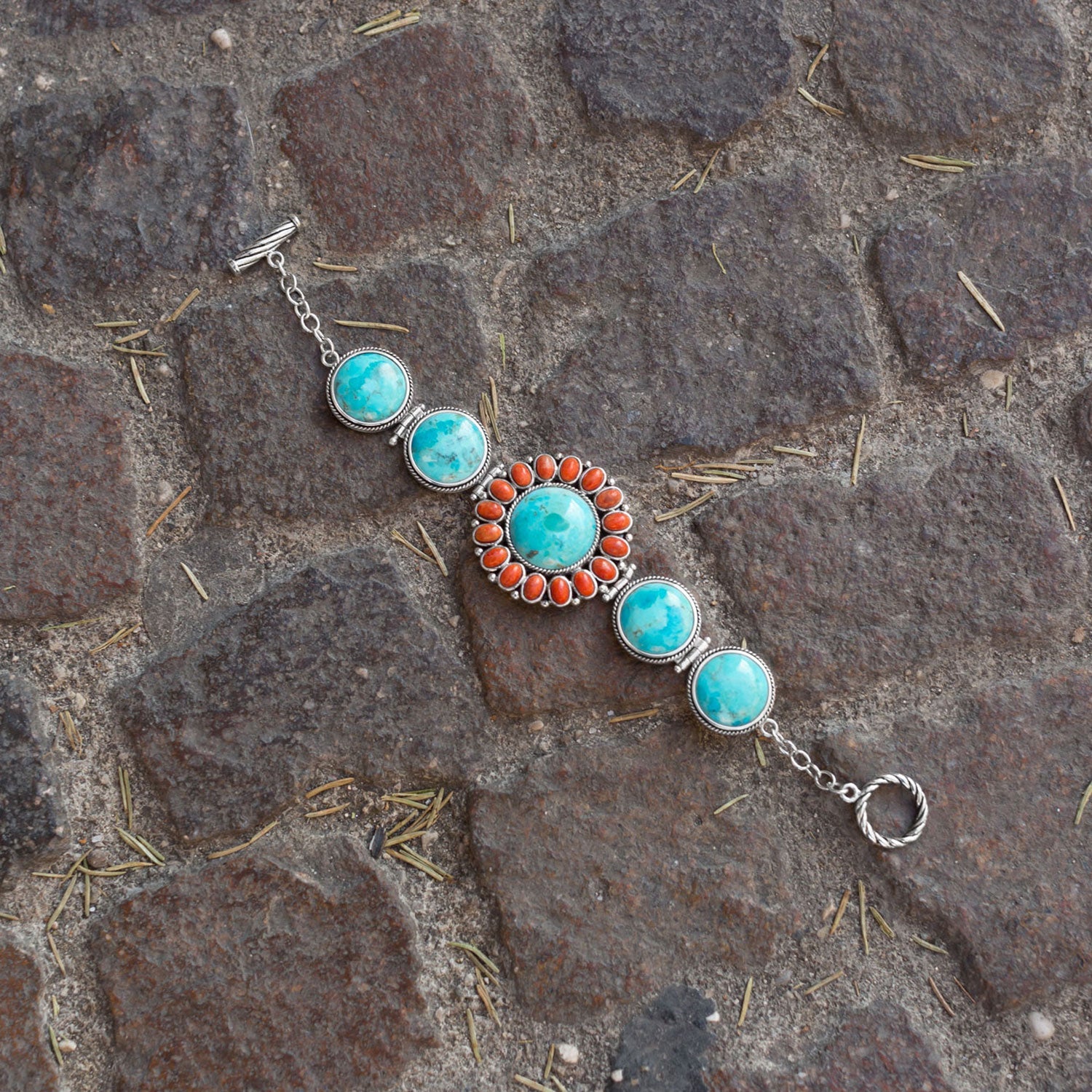 7.5" Reconstituted Turquoise and Coral Sunburst Toggle Bracelet