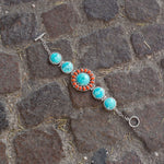 7.5" Reconstituted Turquoise and Coral Sunburst Toggle Bracelet