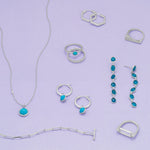 Rhodium Plated Hoop Earrings with Faceted Turquoise Charm