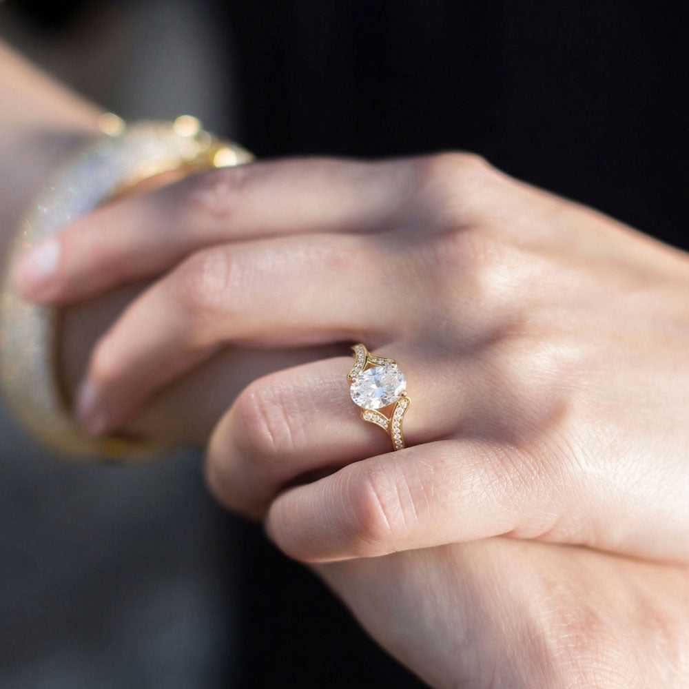 14 Karat Gold Plated Solitaire Oval Ring with CZ Band