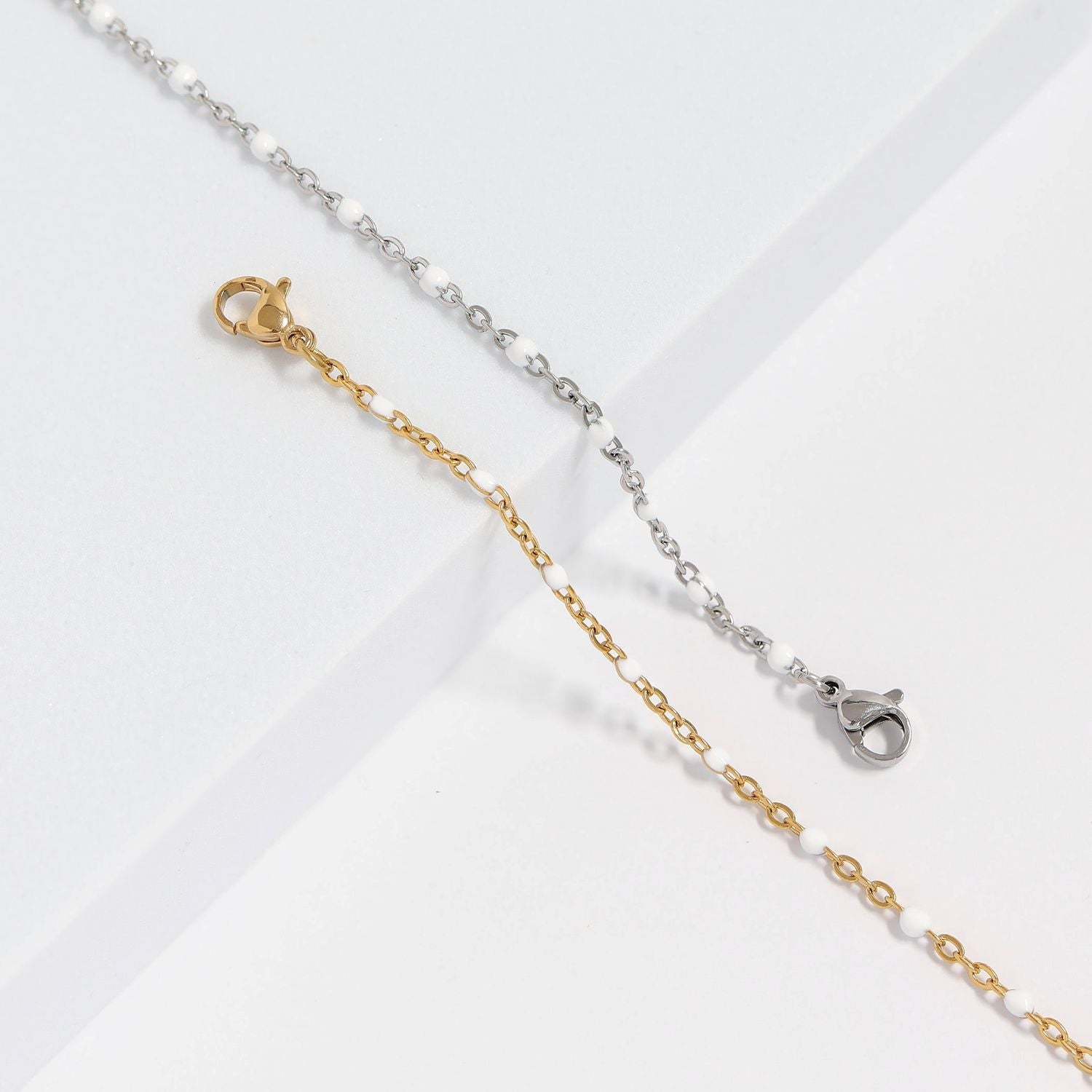 6.5" + 1" 18 Karat Gold PVD Stainless Steel White Confetti Satellite Bracelet