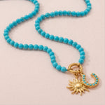 18 Karat Gold PVD Stainless Steel Synthetic Turquoise Horseshoe Charm